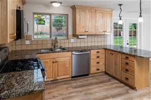 Updated kitchen, Maytag appliances, Updated Custom Solid Maple Cabinets, Granite Countertops,Tile Backsplash.
