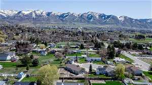 Birds eye view of property featuring the Wasatch Front Mountain Range.