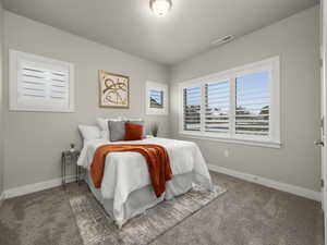 Bedroom featuring carpet flooring