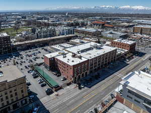 Birds eye view of property with a mountain view