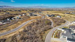 Birds eye view of property with a mountain view