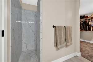Primary walk-in shower marble