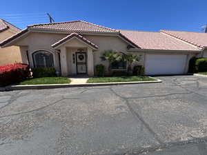 View of front of home with a garage