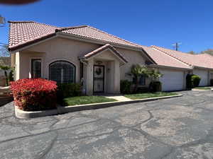 View of front of property with a garage