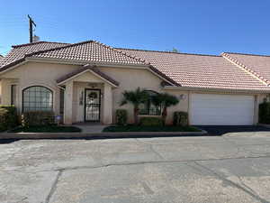 View of front of home featuring a garage