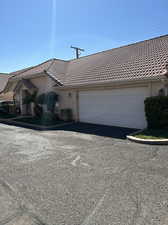 View of front of property with a garage