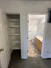 Bathroom with vanity and toilet