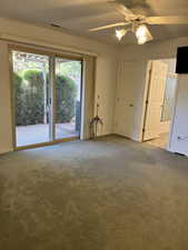 Master Bedroom featuring ceiling fan, carpet floors