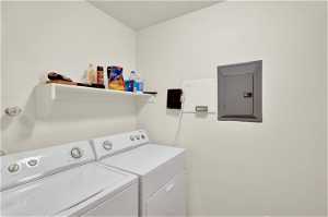 Laundry room featuring independent washer and dryer