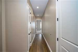 Hallway featuring dark hardwood / wood-style flooring
