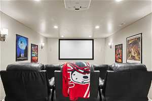 Theater Room with projector & screen, AV receiver, and plush theater-style seating - all included!