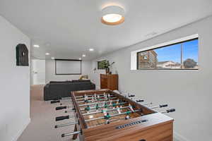 Game room with carpet floors