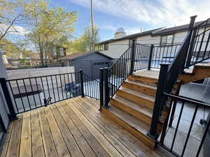 Deck featuring an outdoor structure