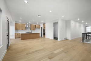 Living room featuring light hardwood / wood-style floors and sink