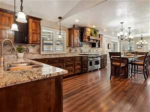 Kitchen with lots of counter space, granite countertops and upgraded high-end appliances
