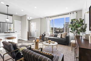 Living room with light wood-type flooring