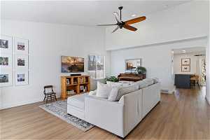 Beautiful LVP in large living room with vaulted ceilings