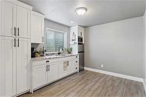 Kitchenette downstairs, great for hosting game nights or hosting guests