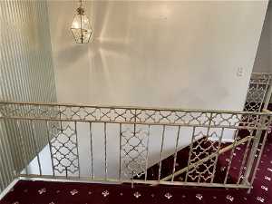 EXQUISITELY ORNATE RAILING LEADING TO DOWNSTAIRS!!
