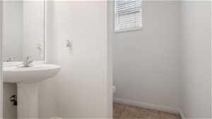 1/2 bath on ground level as you come in from garage.