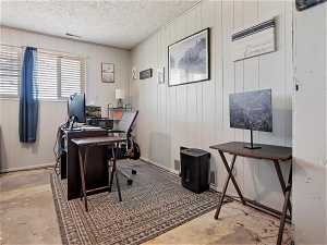 Home office with a textured ceiling