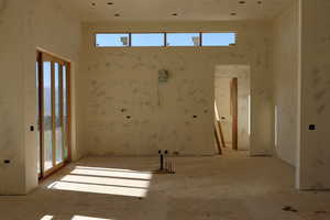 Spare room featuring a wealth of natural light