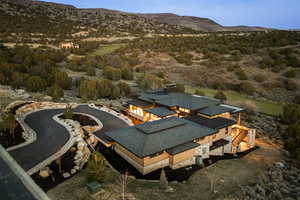 View from above of property with a mountainous background