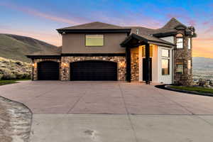 View of front of property with a garage