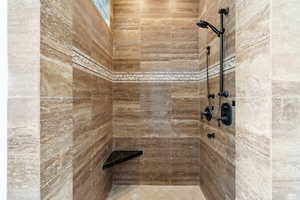 Bathroom with tiled shower