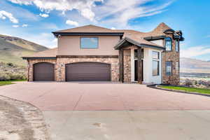 View of front of home featuring a mountain view