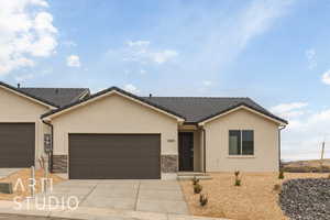 Ranch-style house featuring a garage