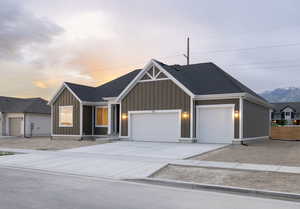 View of front of property with a garage