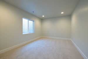 View of carpeted spare room