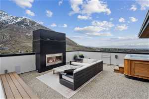 Primary Bed/Bath Suite's Private Oversized Outdoor Living Space w/Hot Tub & Fireplace