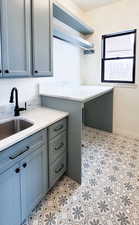 Laundry area featuring sink