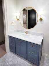 Bathroom featuring vanity and tile patterned flooring