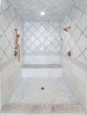 Bathroom featuring tiled shower