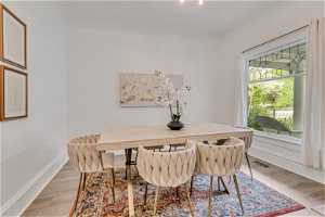 Great dining room or home office space with original coved ceilings and front picture window