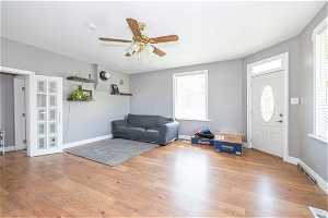 Interior space with light hardwood / wood-style floors and ceiling fan