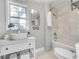 Full bathroom featuring shower / tub combo
