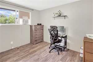 Home office featuring light hardwood / wood-style flooring