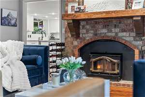 Interior details with a fireplace, hardwood / wood-style floors, and sink