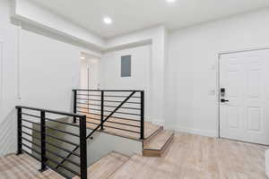 Entryway with light wood-type flooring