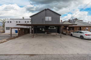 View of front of home featuring a carport