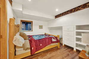 Bedroom featuring hardwood / wood-style flooring