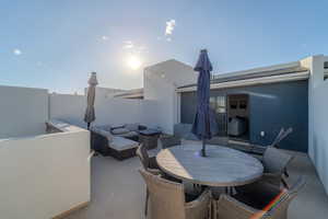 View of patio featuring an outdoor hangout area