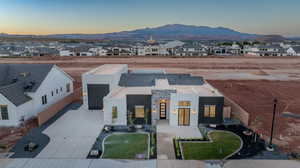 View of front of property with a mountain view