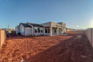 Rear view of house featuring central AC unit