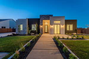 View of front of house with a front yard