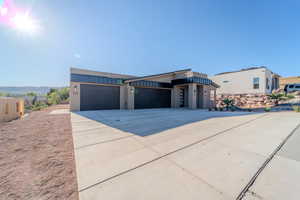 Contemporary home featuring a garage